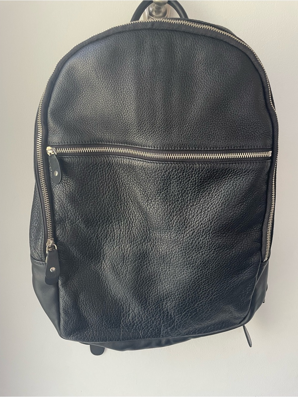 Roots Pebbled Black Leather Backpack with Silver Zippers